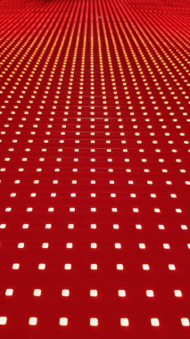 RGB LED ekran dokusu. Duvar kâğıdı için bokeh ile piksel LED ekranı kapat. Parlak kırmızı soyut arkaplan herhangi bir tasarım için mükemmel