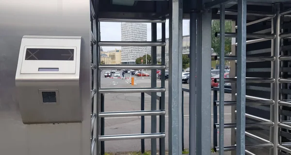 Entrance to the football stadium during the day without people. Secure entrance gates - outdoor turnstiles at the stadium. Guarded entrance