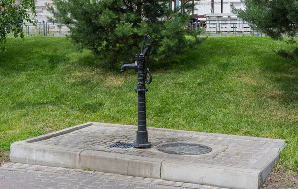 View of the street water pump — Stock Image View of the street water pump Royalty Free Stock Photos