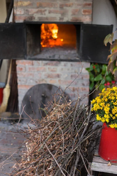 firewood, loppings in front of the old stove or furnace