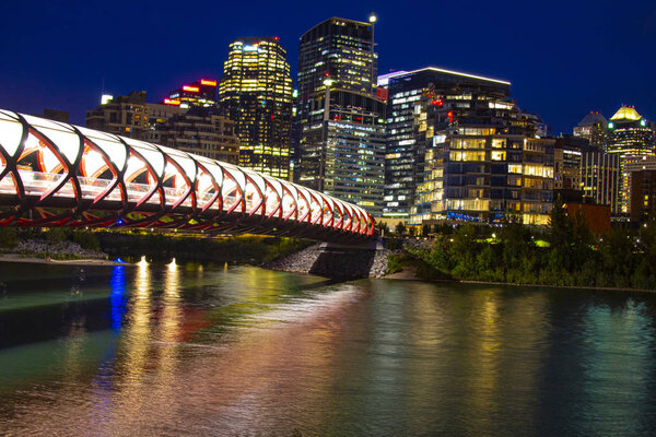 Calgary Downtown with the Peace bridge with the skyline on the background during summer