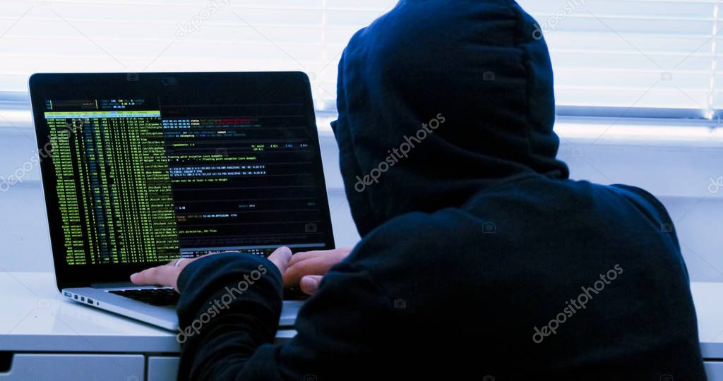 Hacker typing fake dummy code