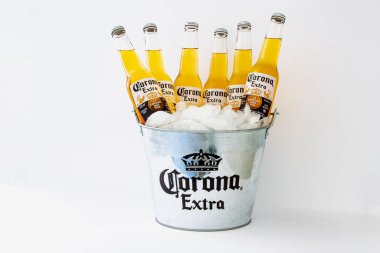 Calgary, Alberta, Canada. June 07, 2020. A bucket of Corona with ice and beers not open. clipart