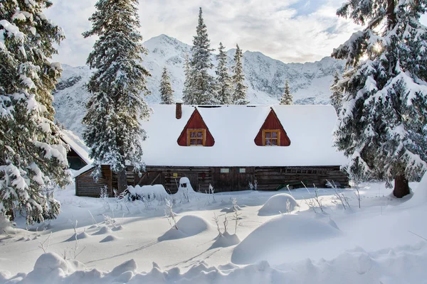 mountain cottage in winter, beautiful winter landscape