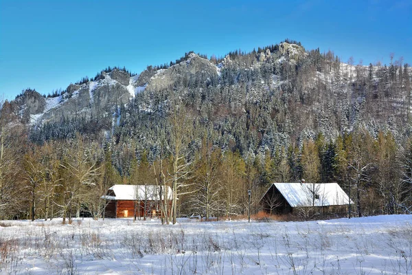 mountain cottage in winter, beautiful winter landscape