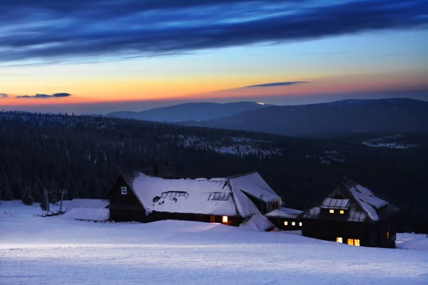 mountain hostel after the dusk, winter