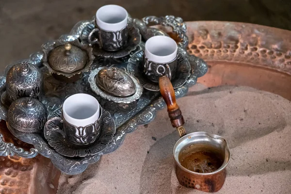 Turkish coffee is cooked in the sand.traditional turkish coffee. Sirince, izmir , Turkey