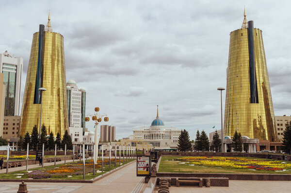 Golden towers and the government building in Nursultan.