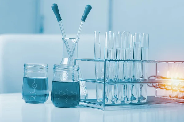 Science concept.Laboratory glassware containing chemical liquid.