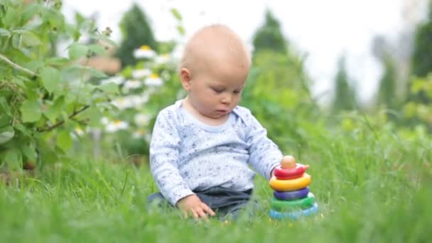 Cute Toddler Child Boy Playing Colorful Rings Garden Springtime Backyard — Stock Video