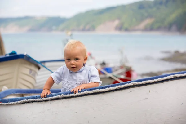 Sweet Toddler Boy Sitting Boat Harbor Smiling Happily Camera — Stock Photo, Image