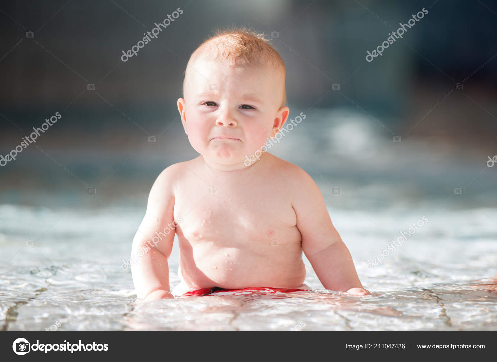 Little Cute Baby Boy Swimming Happily Shallow Pool Splashing Water