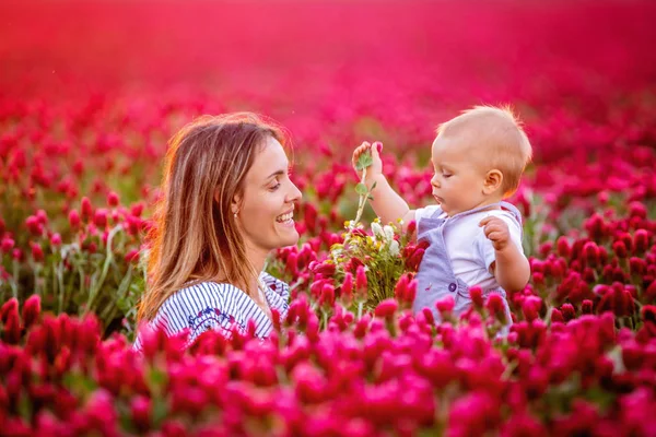 Young Mother Holding Her Todller Son Crimson Clover Field Family — Stock Photo, Image