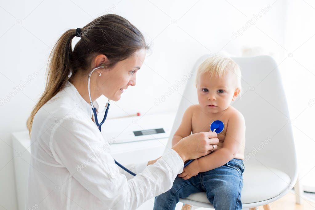 Pediatrician Examining Baby Boy Doctor Using Stethoscope ...