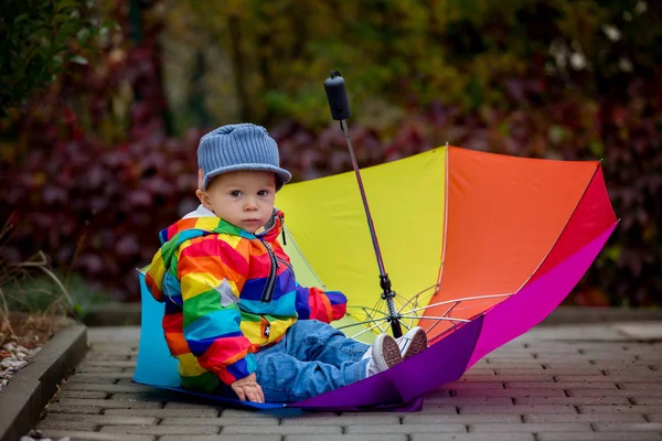 Sweet Funny Child Rainboy Coat Multicolored Umbrella Jumping Puddles Iand — Stock Photo, Image