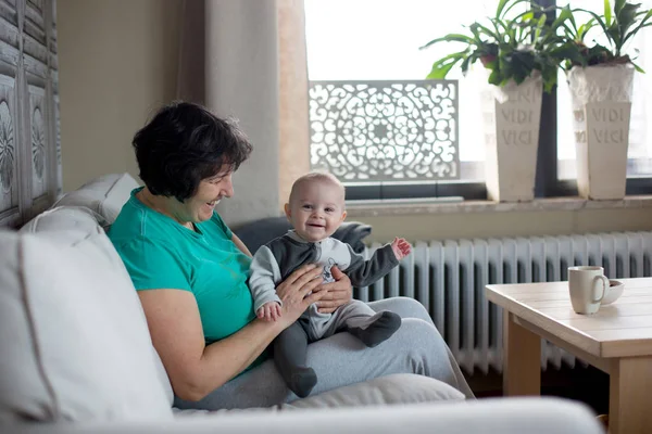 Grandmother Holding Little Toddler Boy Sitting Cozy Living Room Lots — Stock Photo, Image