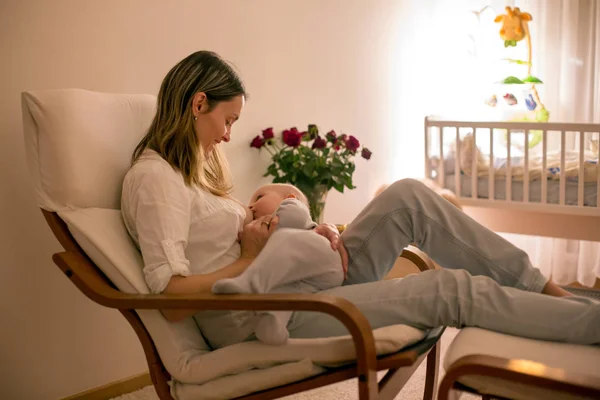 Young Beautiful Mother Breastfeeding Her Newborn Baby Boy Night Dim — Stock Photo, Image