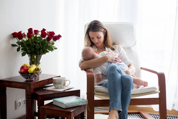 Mother Playing Her Toddler Boy Home Rocking Chair Smiling Breastfeeding — Stock Photo, Image