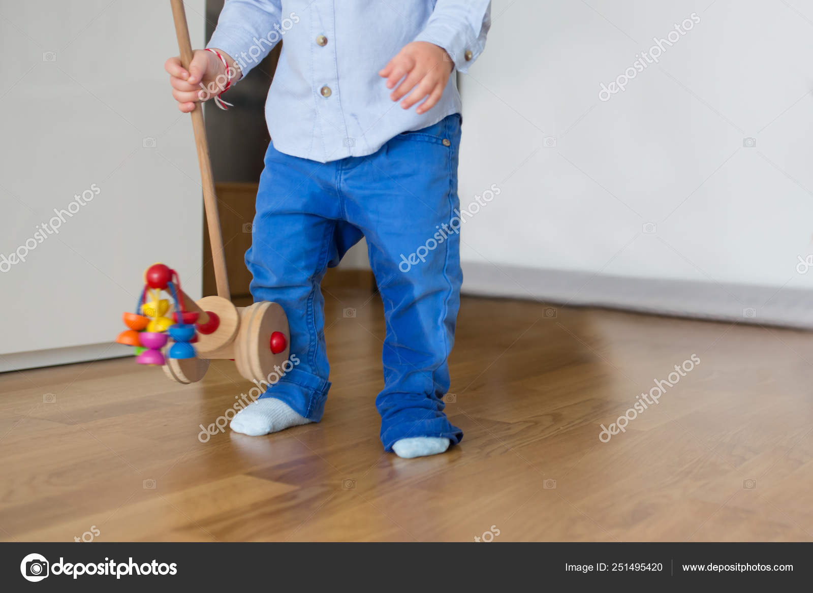 Little toddler child, boy, pee in his pants while playing with