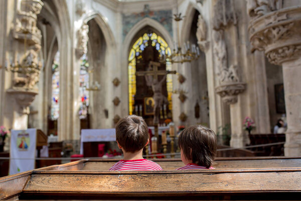 Little child in big cathedral