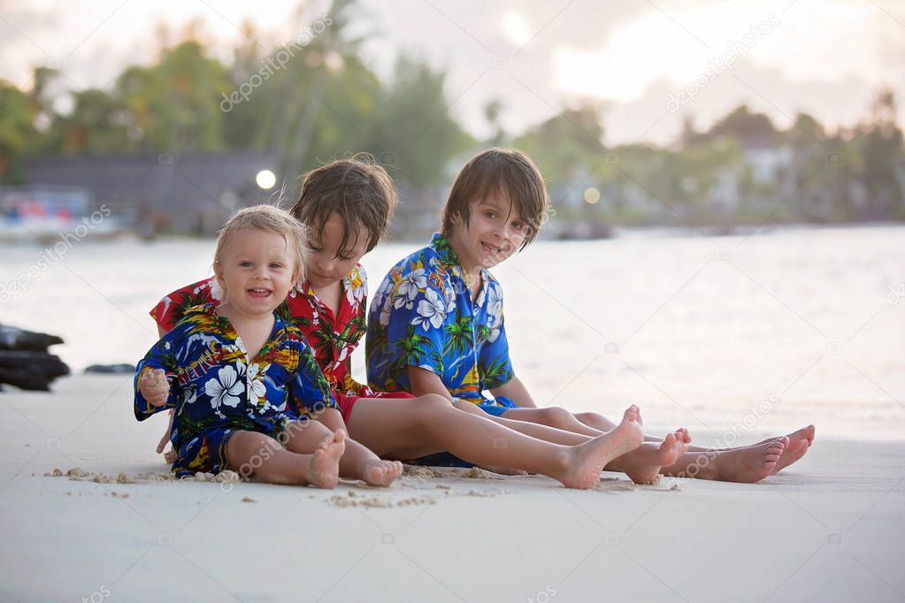 Happy beautiful fashion family, children, dressed in hawaiian sh