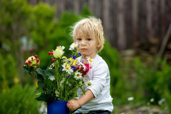 Child Holding Rubber Boots Beautiful Flowers Garden — Stock Photo, Image