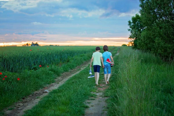 Happy Children Boy Brothers Holding Pair Sneakers Hands Walking Rural — Stock Photo, Image