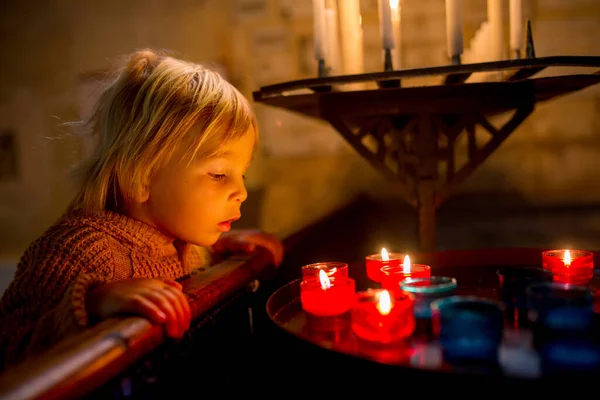 Little Toddler Boy Praying Chapel Candles Front Him — Stock Photo, Image
