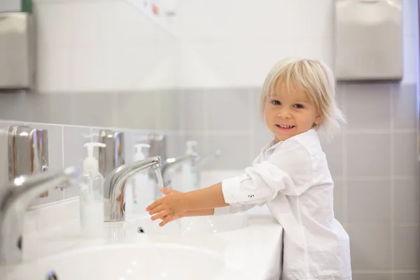 Little Preschool Child Blond Boy Washing Hands Bathroom Kindergarden Hygiene — Stock Photo, Image