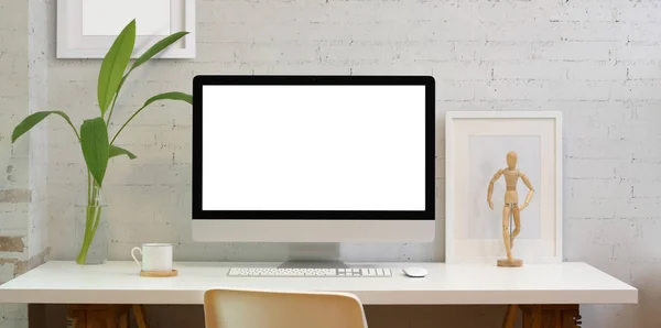 Blank screen desktop computer in minimal style office — Stock Photo, Image