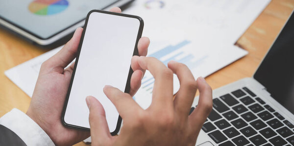 Businessman searching for idea in martphone 