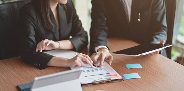Cropped view of motivated businesspeople planing the project 