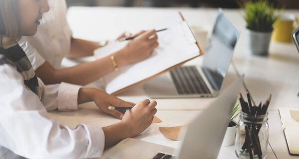 Female asian businesswoman discussing the marketing project