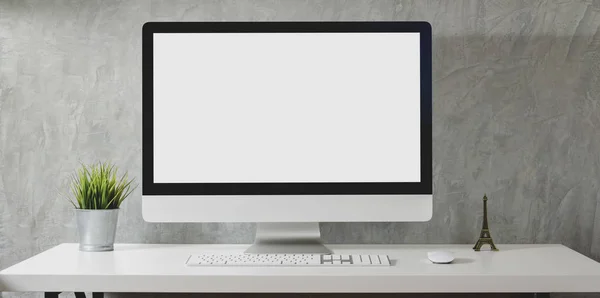 Loft workspace with mock up desktop computer with tree pot and decorations on white desk and grey wall background — Stock Photo, Image