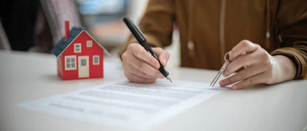 Cropped Shot Woman Signing Home Loan Agreement While Holding House — Stock Photo, Image