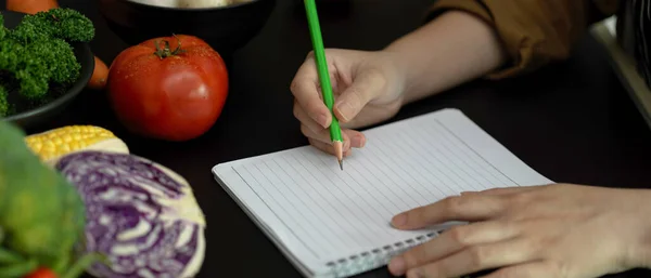 Close View Female Student Taking Recipe Notes Blank Notebook Black — Stock Photo, Image