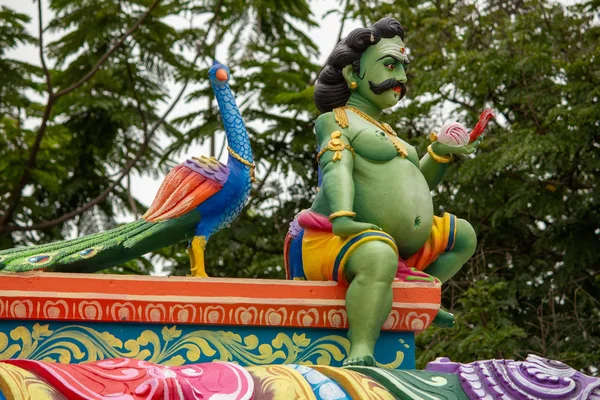 View of Indian idol sitting along with peacock in murugan temple — Stock Photo, Image