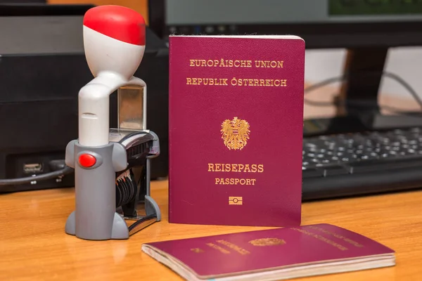 Close-up of Austrian biometric passport with a date stamper, int — Stock Photo, Image