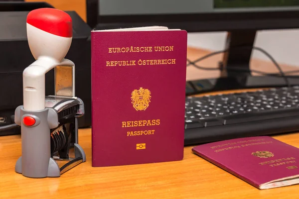 Close-up of Austrian biometric passport with a date stamper, int — Stock Photo, Image