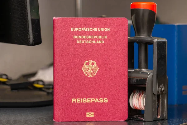 Red biometric passport of a German citizen with a border date st — Stock Photo, Image