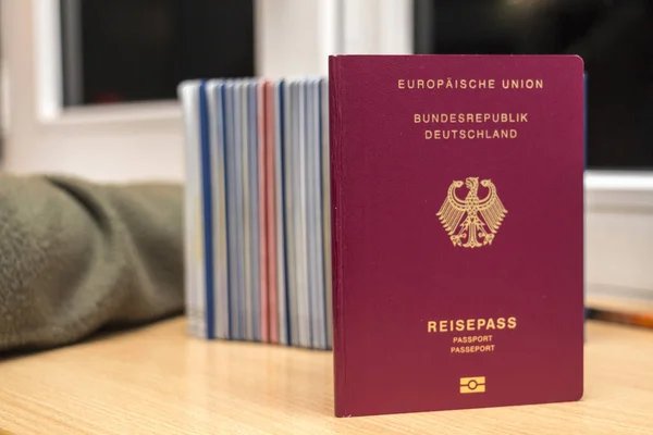 Close-up of German bimetric passport together with other passpor — Stock Photo, Image