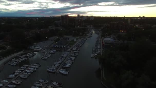 Slow Aerial Gliding Shot Marina Boats Docked Each Side Waterway — Stock Video