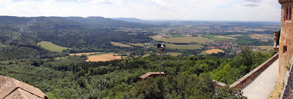 Panoramic view of the green valley, fields and villages from the Hohenzollern Castle in Germany