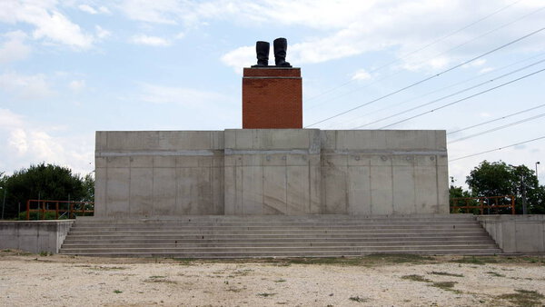 Memento Park, Socialist era sculptures - Stalin 's Boots on a pedestal, Budapest, Hungary
