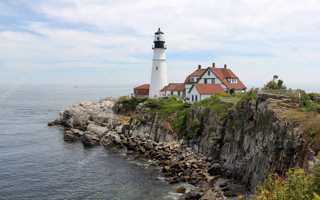 Portland Head Light, historic lighthouse at the entrance of Portland Harbor, completed in 1791, the oldest lighthouse in Maine, Cape Elizabeth, ME, USA - July 25, 2020