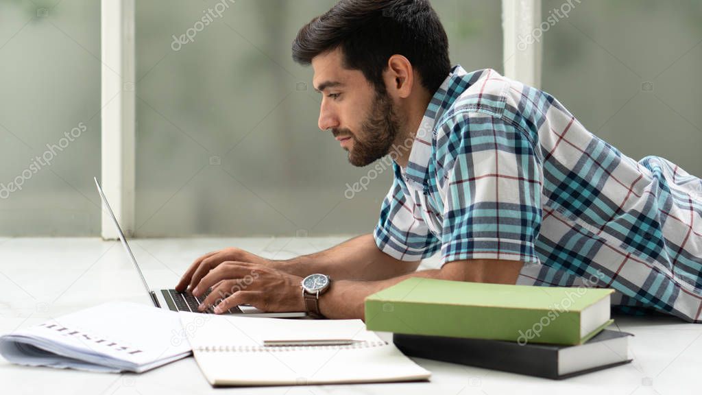 freelance businessman working at home while studying in universi