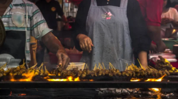 The blurred image of roasting meat, chicken and mutton Satays at — 스톡 사진