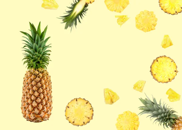 Natural fresh fruit background of pineapple on yellow background — Stock Photo, Image