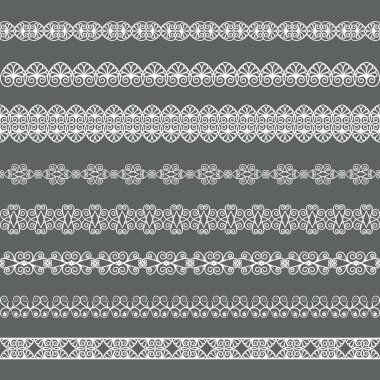 Gri bir arka plan üzerinde beyaz kenarlık kümesi