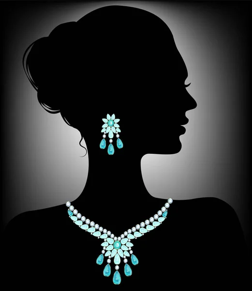 Silhouette of a woman in a necklace of diamonds and aquamarines